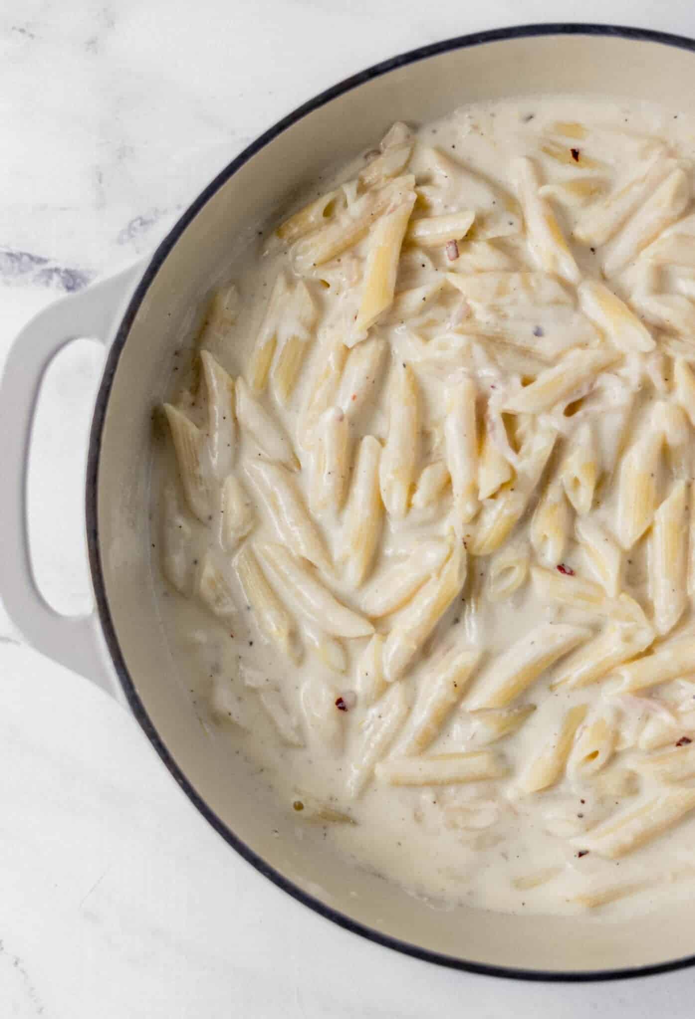 pasta and sauce combined in large pan
