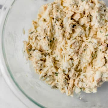 finished tuna salad in a large glass mixing bowl