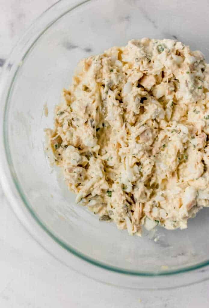 finished tuna salad in a large glass mixing bowl