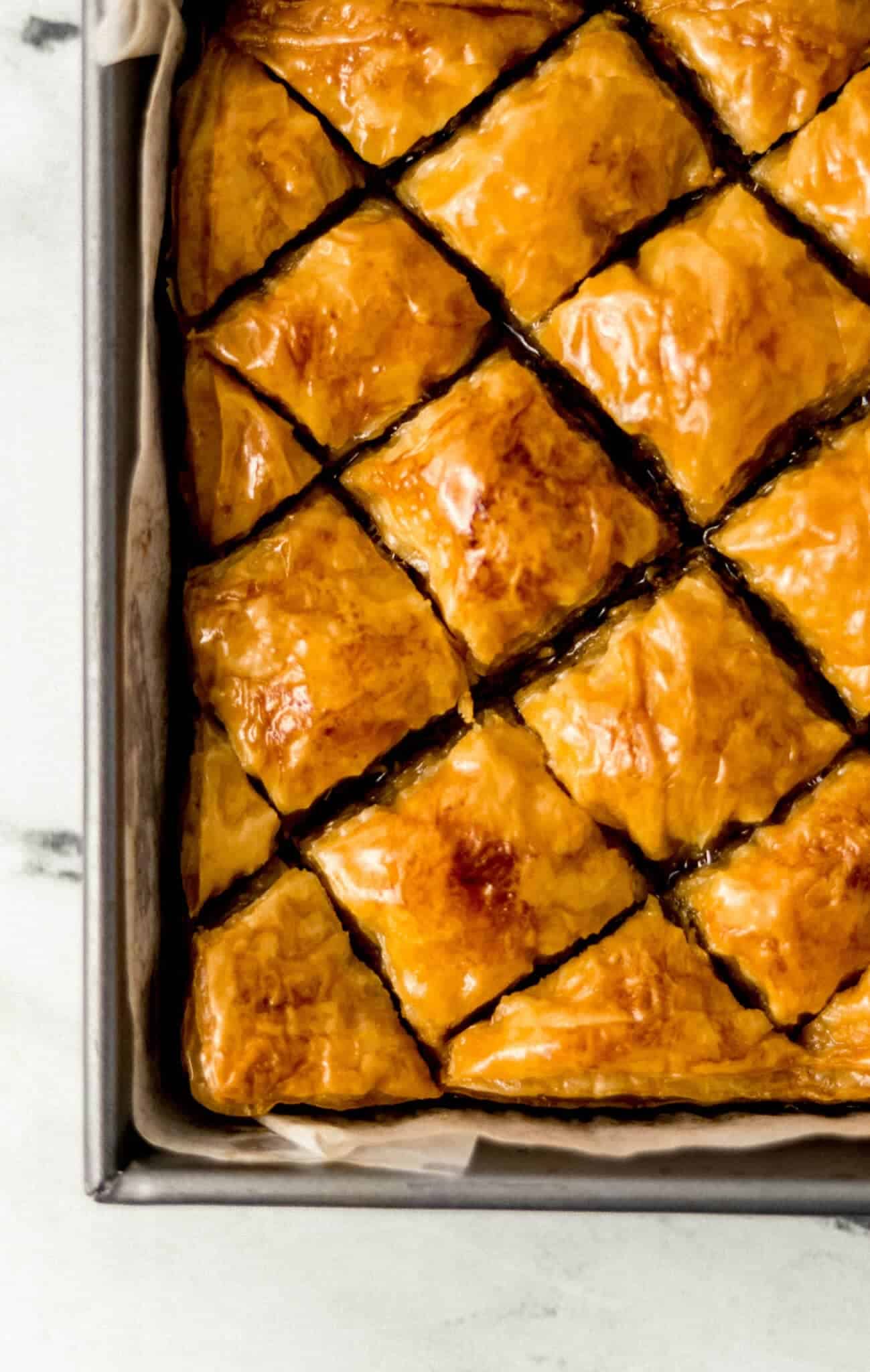 close up overhead view of finished baklava in baking pan 
