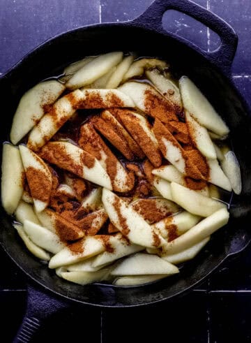 Cinnamon and nutmed added to skillet with apples and butter.