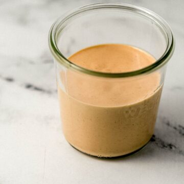 Close up side view of jar with finished sauce in it.