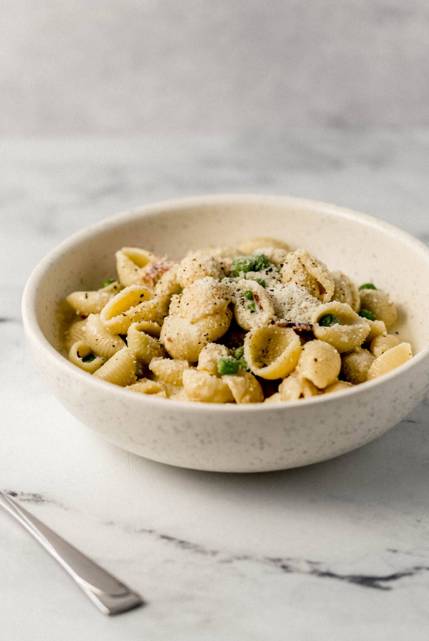 close up side view of a bowl of pasta