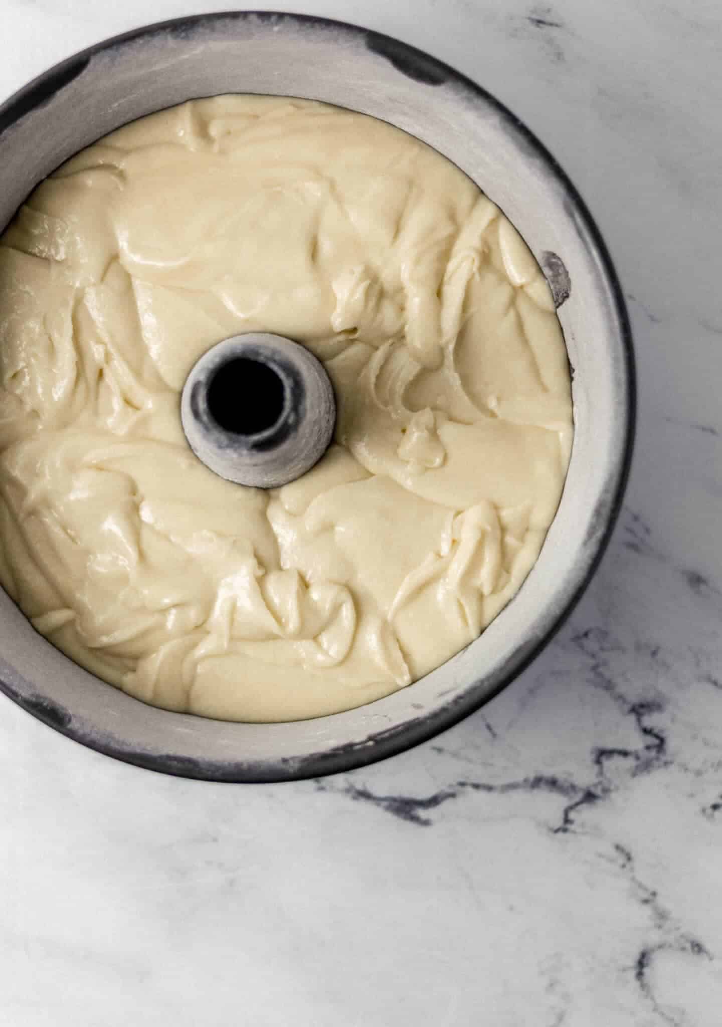 pound cake mixture added to prepared bundt pan