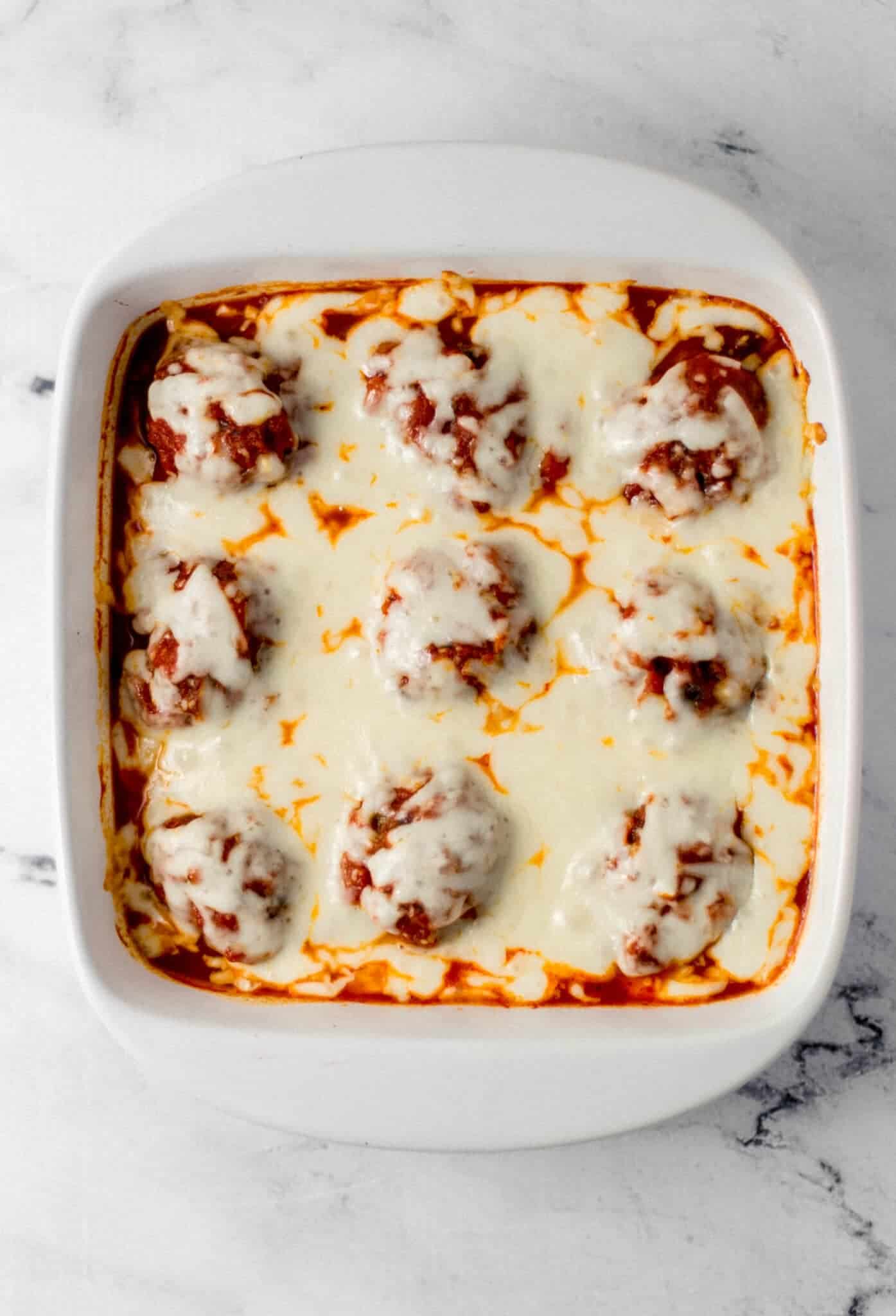 baked casserole in square white baking dish