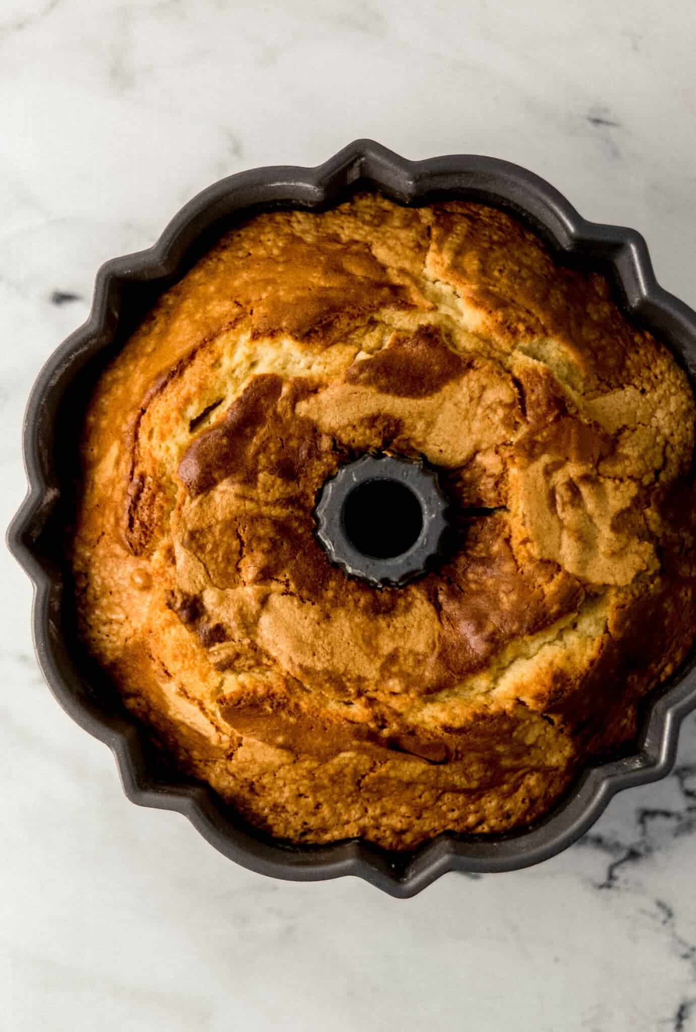 overhead view of baked cake in pan