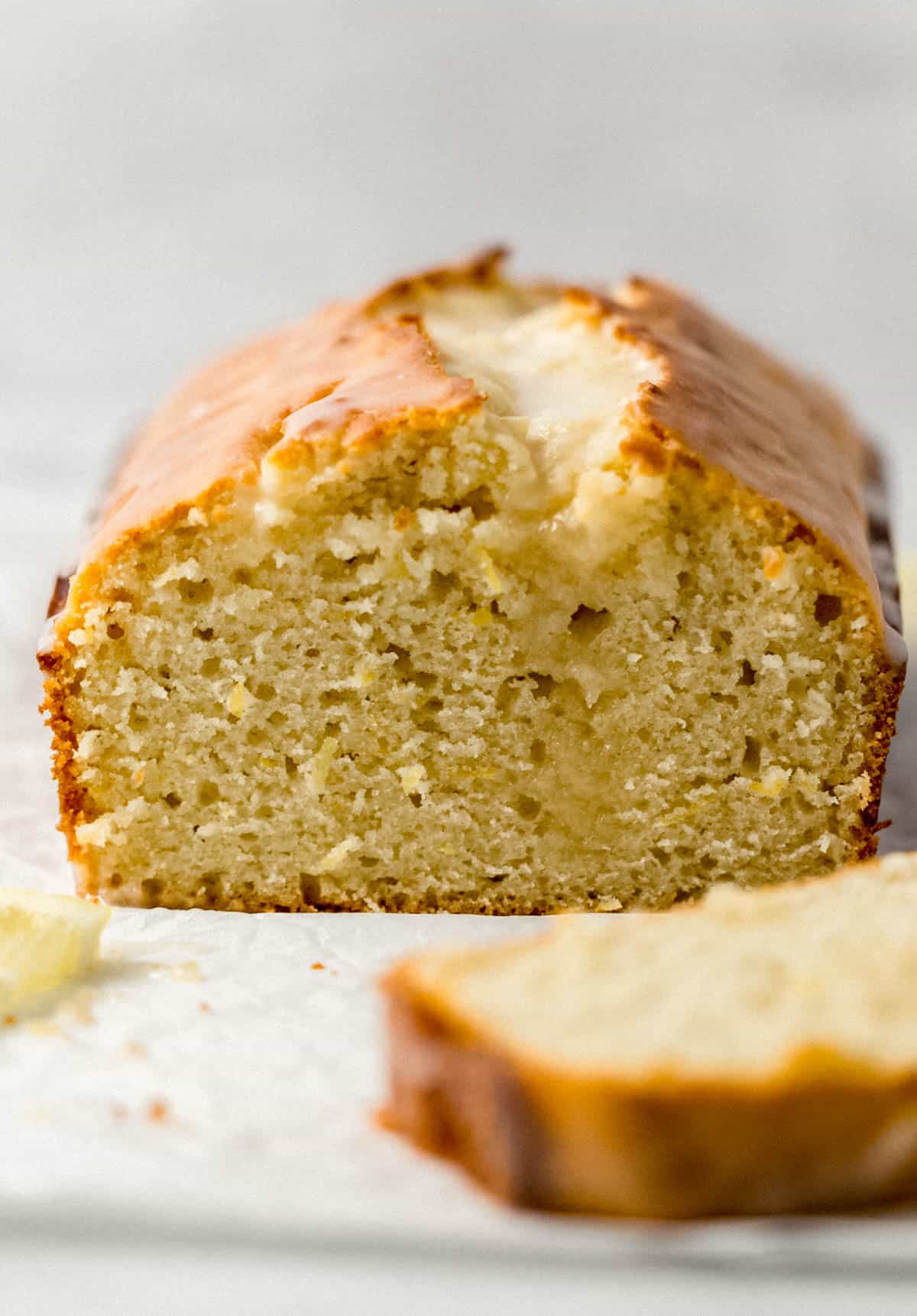 close up front view of cut bread on parchment paper 