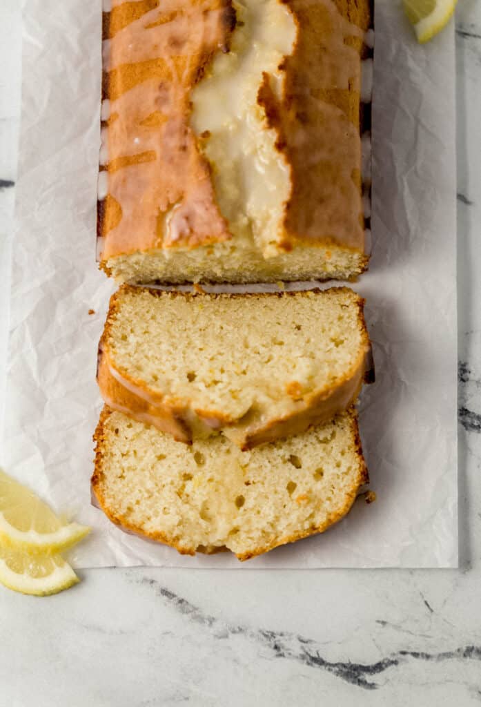 overhead view of sliced bread on parchment paper