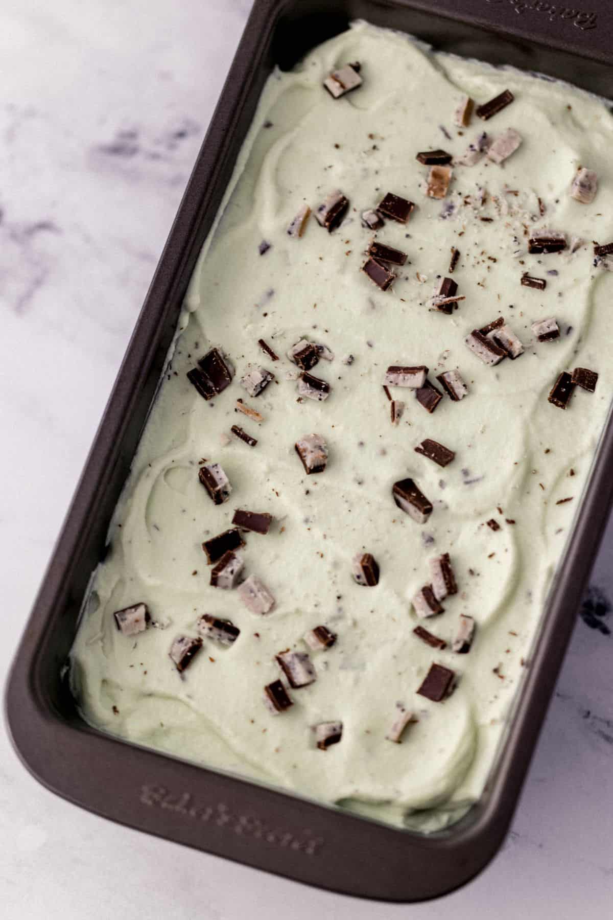 ice cream added to loaf pan before placing in the freezer 