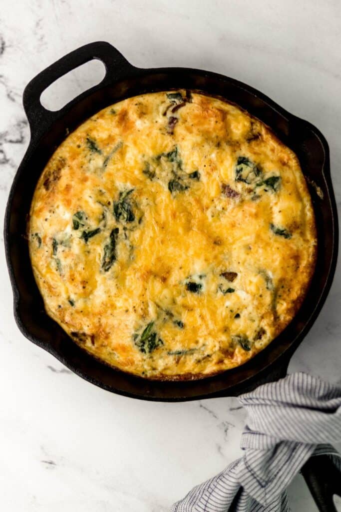 overhead view of fritatta in cast iron skillet