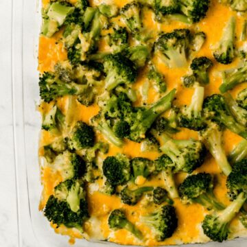 overhead view of finished broccoli casserole in glass baking dish