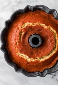 Overhead view of baked cake in pan.