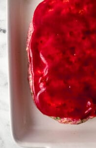 Glaze added to meatloaf in baking dish before baking.