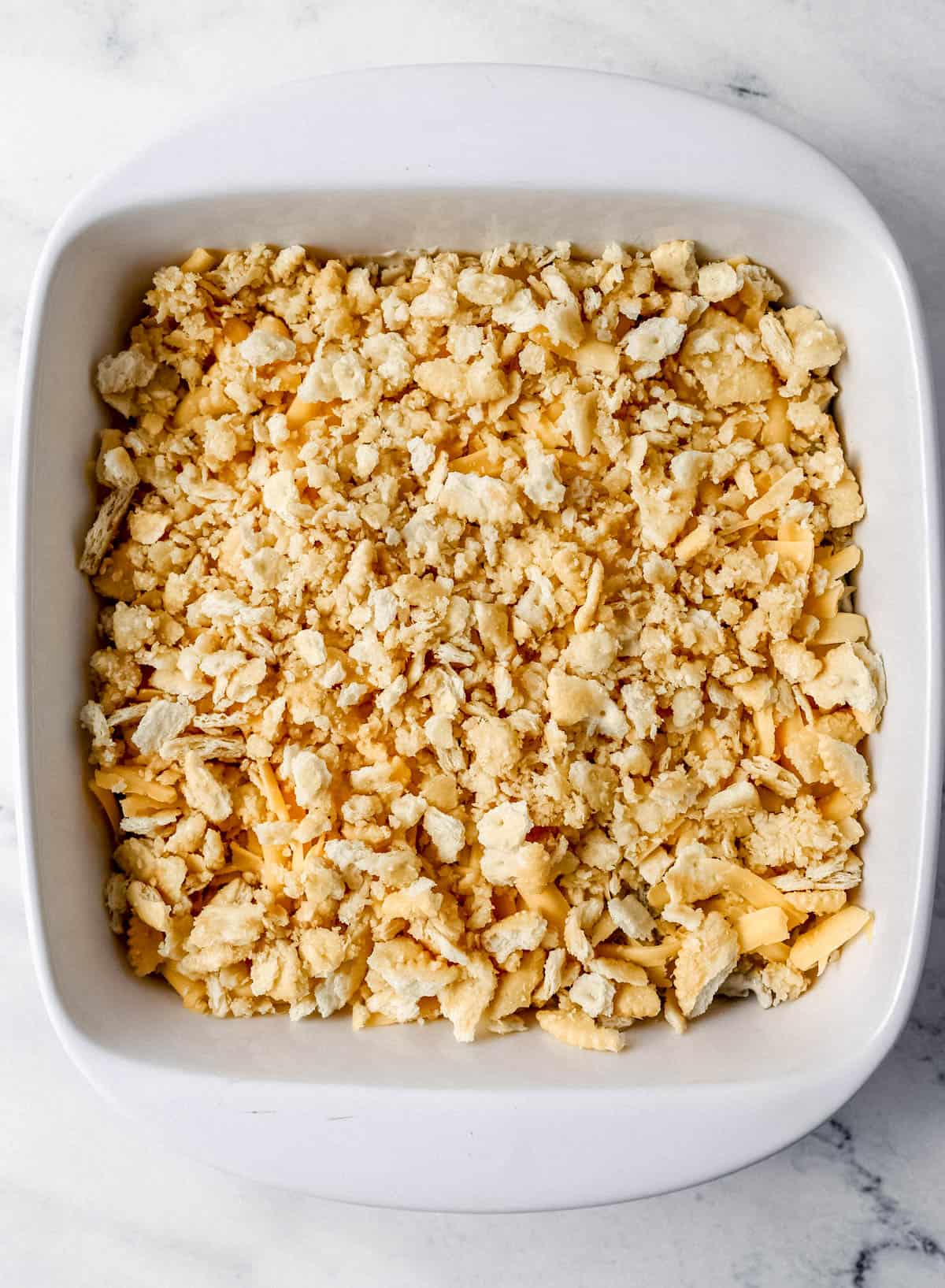 Buttery cracker mixture added to the top of the casserole in the baking dish before baking. 