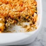 Close up view of casserole with scoop taken out of it.