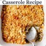 Overhead view of finished casserole with serving spoon in it pin with text overlay.