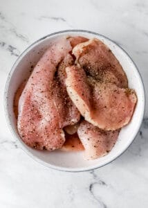 Overhead view of seasoned chicken.