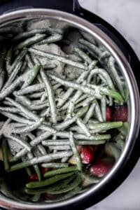 Seasoning added to instant pot with other ingredients.