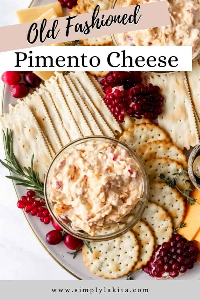 Close up of pimento cheese in glass bowl on snack tray pin with text overlay.