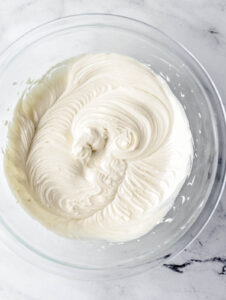 Icing ingredients combined in mixing bowl.