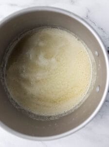 Melted butter and flour combined in large pot.