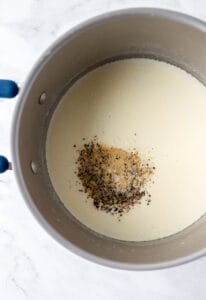 Spices added to the roux mixture in a large pot.