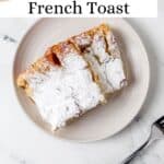 Overhead view of two pieces of french toast on plate pin with text overlay.