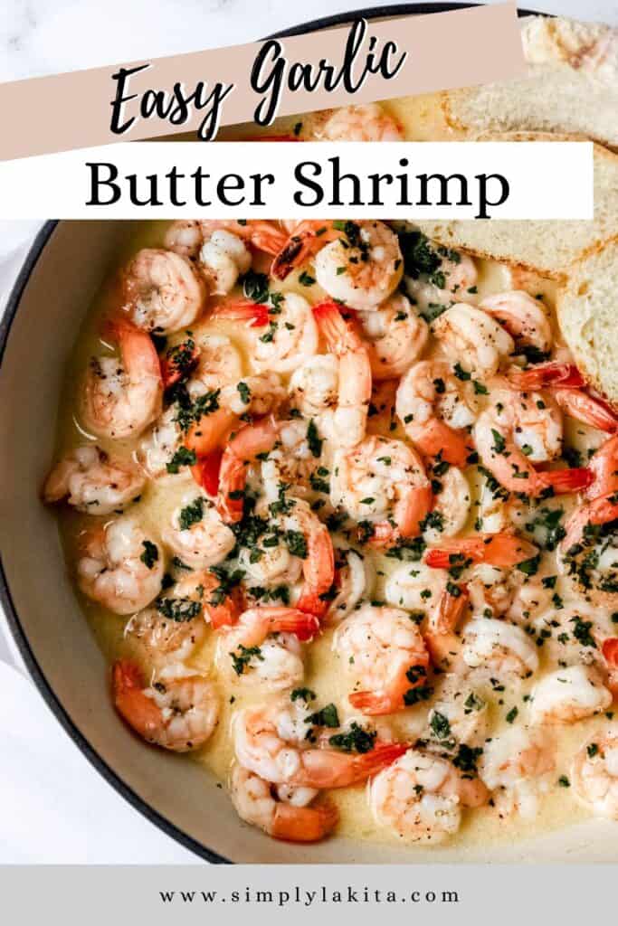 Fresh shrimp, onion, garlic, and butter arranged on a wooden cutting board