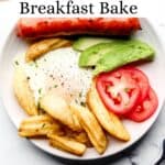 Overhead view of white plate with breakfast on it on marble surface pin with text overlay.