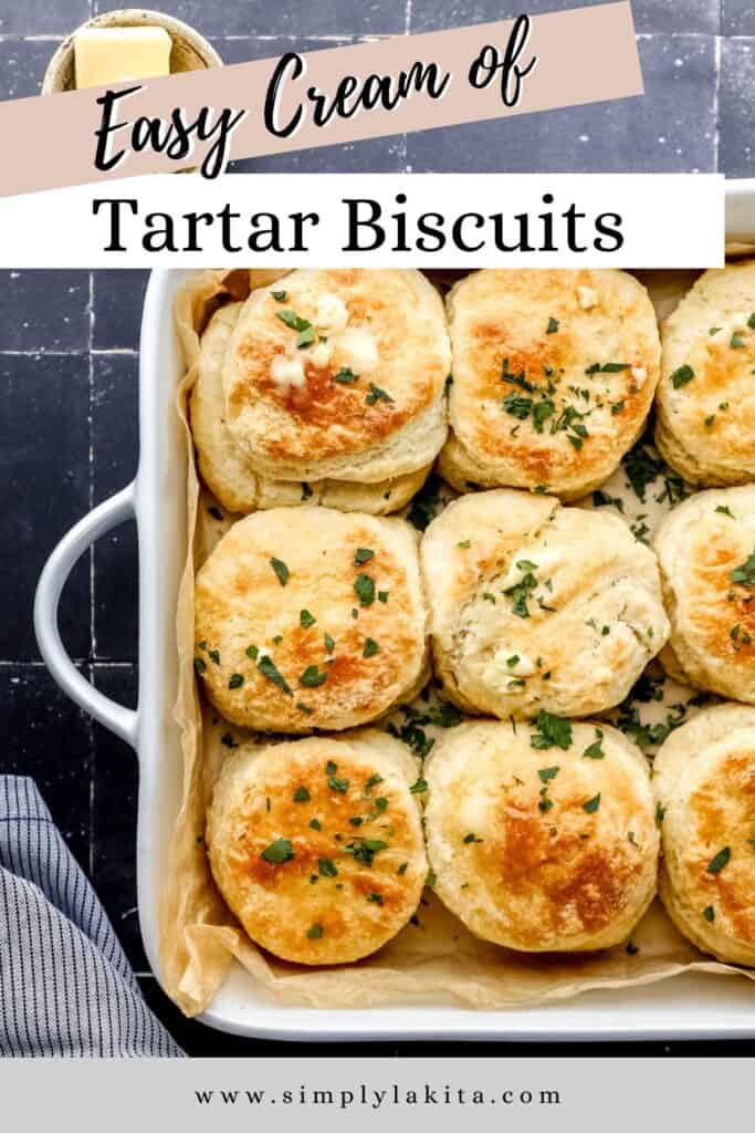 Overhead view of cream of tartar biscuits in parchment lined baking sheet pin with text overlay.