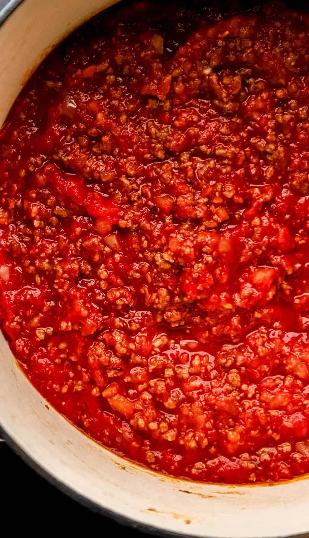 Overhead view of soup mixture in large pot. 