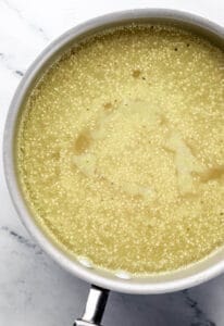 Grit ingredients added to saucepan.