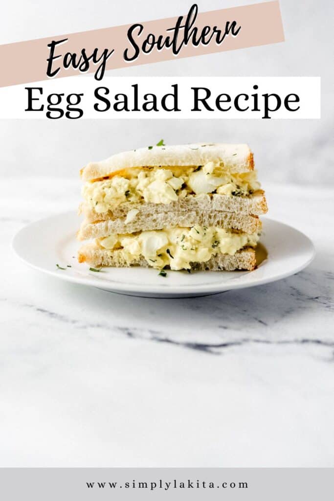 Close up side view of egg salad sandwich on white plate pin with text overlay.