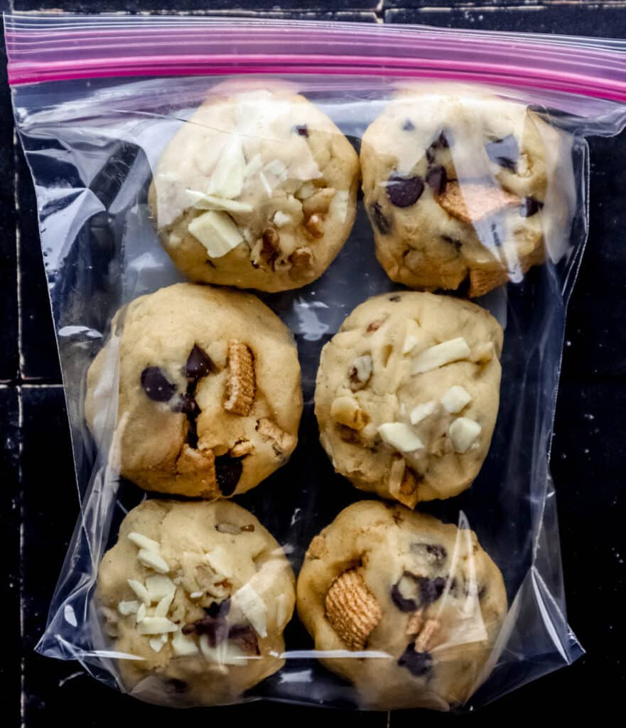 Overhead view of bag with six balls of frozen cookie dough in it.