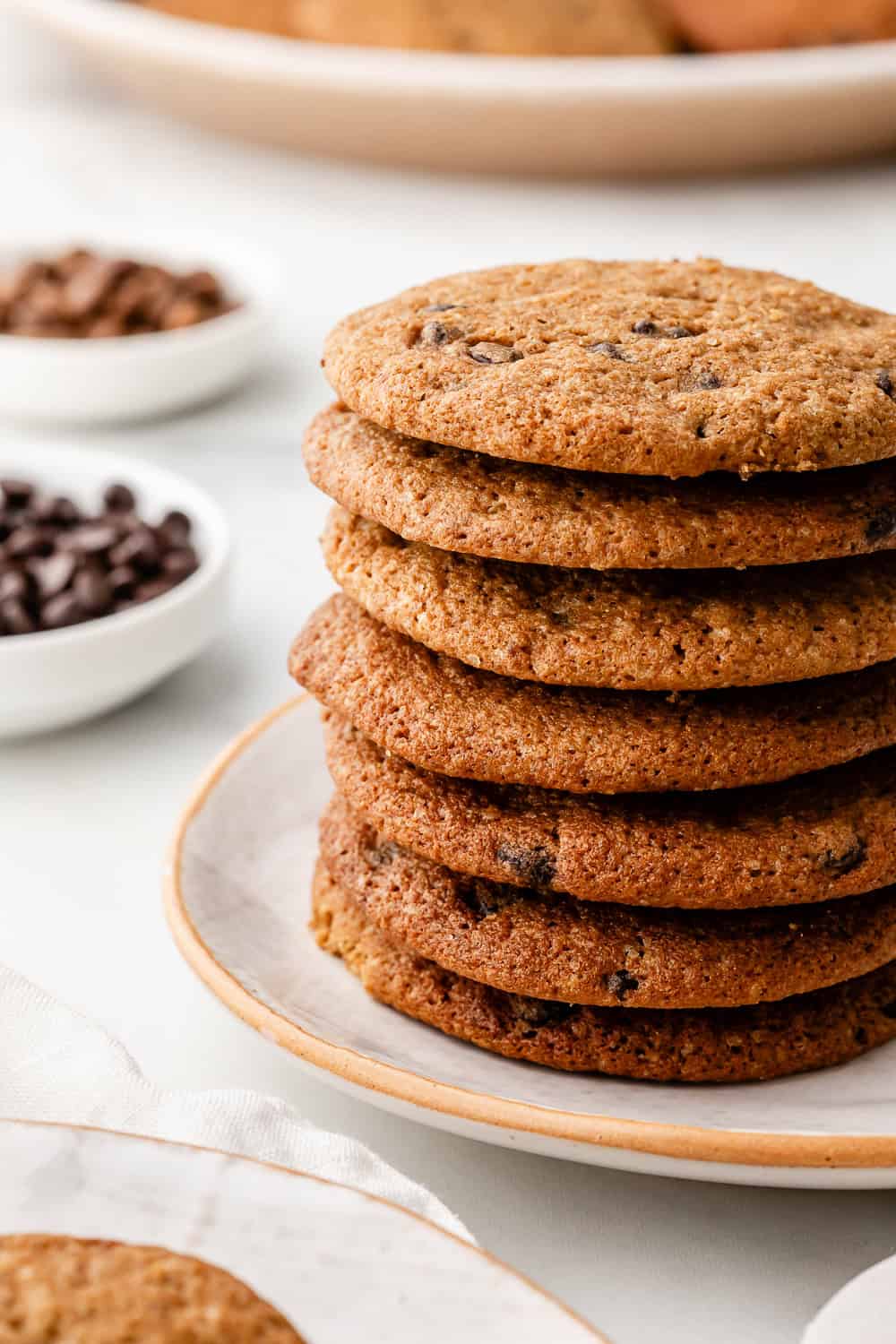 Close up stack of cookies on a plate.