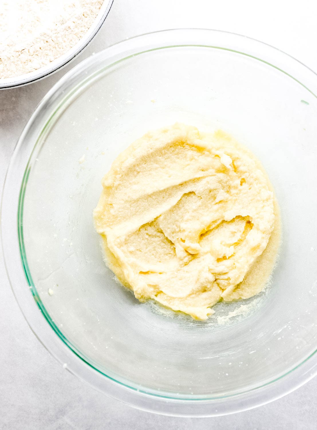 Butter, sugar, egg, and vanilla combined in large glass mixing bowl. 