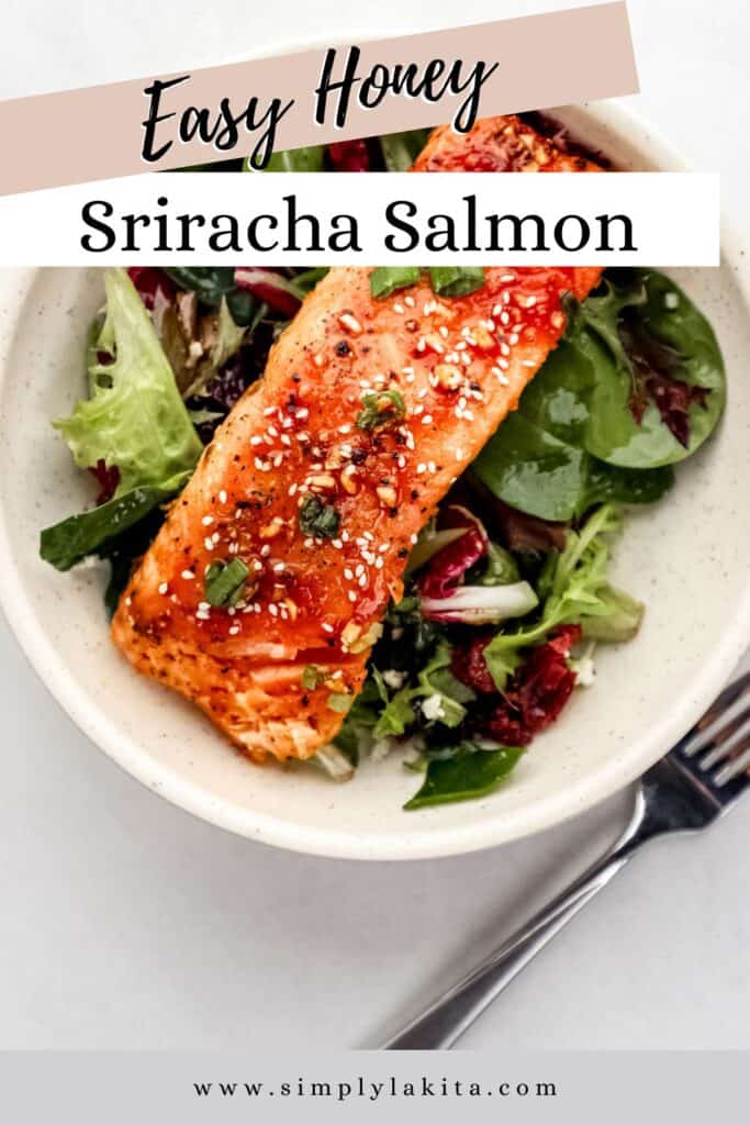 Overhead view of bowl with salmon on top of salad by fork pin with text overlay.