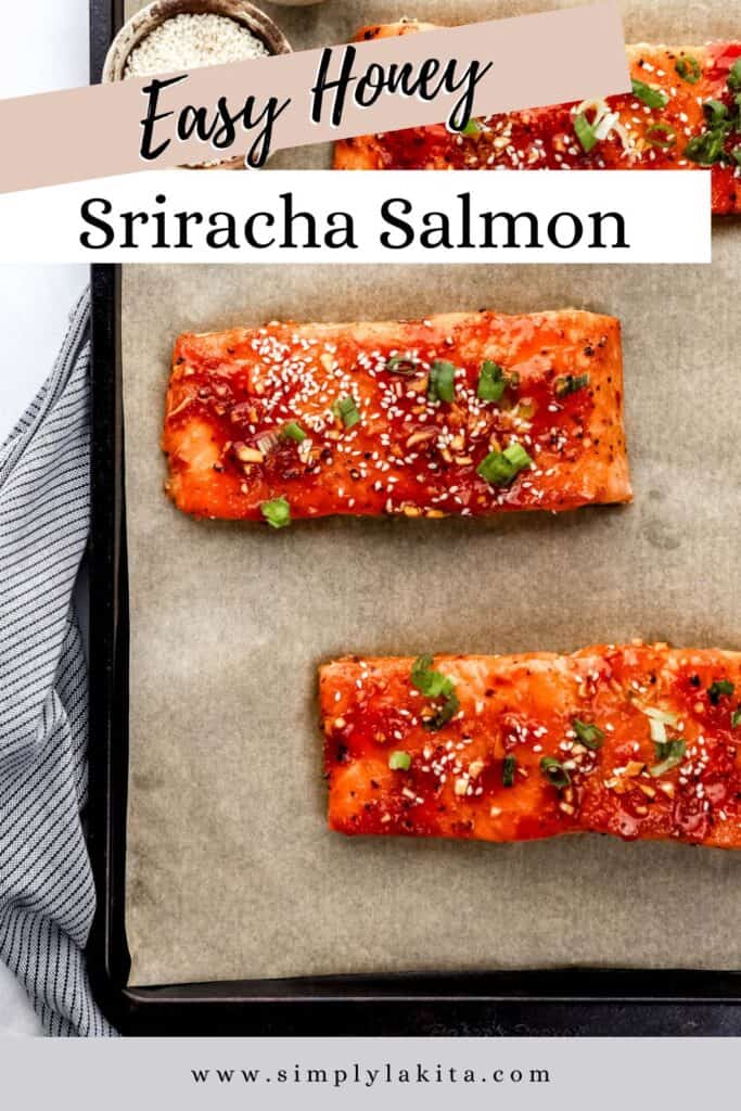 Overhead view of salmon on parchment lined baking sheet topped with sesame seeds and green onion pin with text overlay.