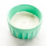 Close up side view of bowl of sour cream.