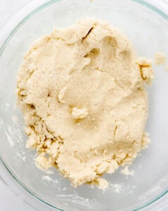 Shortcake dough in large glass mixing bowl.