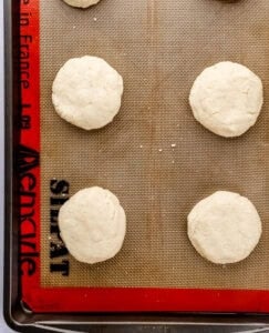 Shortcakes on silplat lined sheet pan before baking.