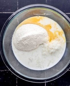 Ingredients added to large glass mixing bowl.
