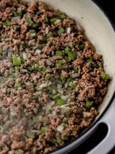 Ground beef added to the onion and peppers in the braiser pan.