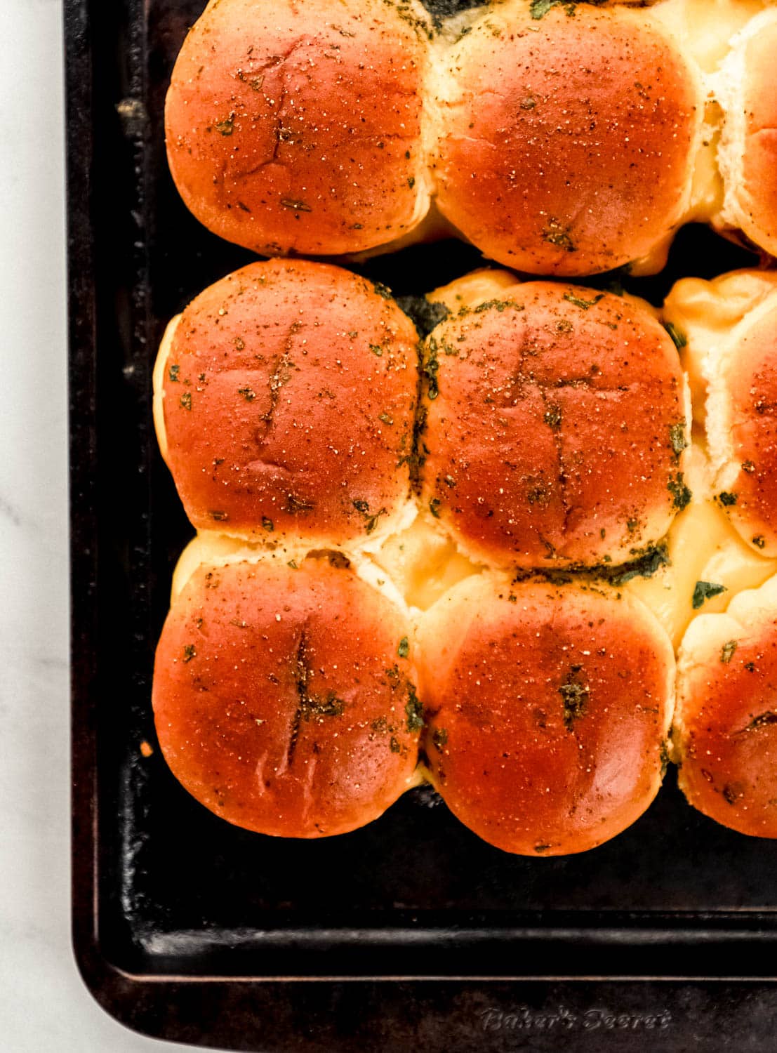 Finished sliders on baking sheet. 