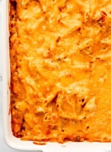 Overhead view of baked pasta in white baking dish.