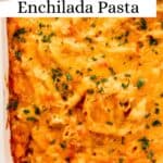 Overhead view of baked pasta in white dish topped with parsley on pin with text overlay.