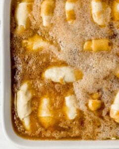 Soda added to the baking dish with the other dumpling ingredients.