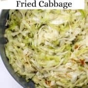 Overhead view of cabbage in skillet on pin with text overlay.