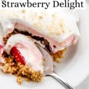 Close up view of serving of dessert on white plate with spoon in it on pin with text overlay.