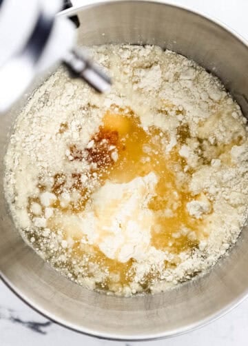 Cake ingredients added to stand mixer bowl.